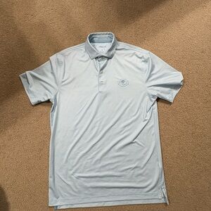 johnnie-O Sky Blue Polo golf Shirt. Embroidered ducks on the chest.